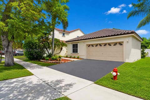 Photo of 116 W Bayridge Dr, Weston, FL 33326 (MLS # A12040012)