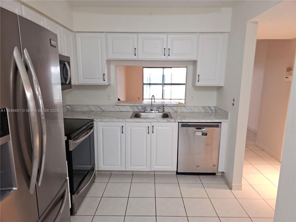 Photo of 7270 Ashford Pl #308, Delray Beach, FL 33446 (MLS # A11836401)