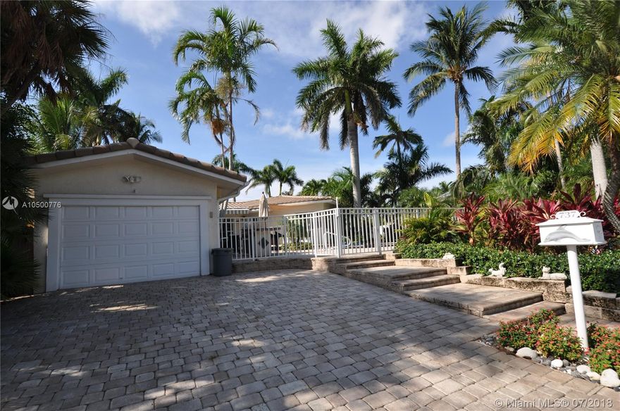 Great location. Just a couple blocks from the ocean. Living in style w/ an elegant flair. Fabulous 3BR / 2BA w/ 1 car garage pool home is located in prestigious Hollywood Lakes. Impact doors/windows throughout. Spacious oversized kitchen w/ gas stove, stainless steel appliances & granite countertops. This contemporary home has vaulted ceilings, crown moldings, Porcelain tile throughout, gas water heater, laundry room, Plantation shutters in living room/bedrooms, & updated bathrooms w/ glass doors. 2nd BA features marble countertops w/ double sink. Screened in patio w/ outside BBQ area w/ fenced backyard and 2 storage sheds. Conveniently located minutes from Anne Kolb Nature Reserve, Intracoastal & downtown Hollywood.