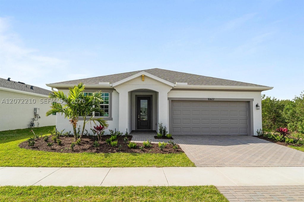 Photo of 10607 SW Orana Dr, Port St Lucie, FL 34987 (MLS # A12072210)