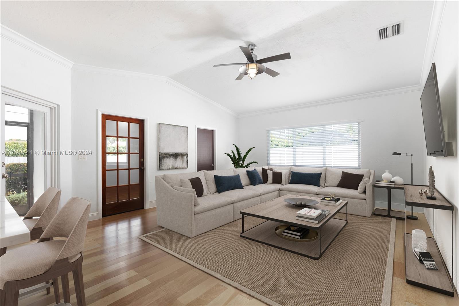 Don’t miss the only renovated and worry-free home in Palmetto Bay under $1M. This impeccable property on a quiet street has it all. Enjoy vaulted ceilings, updated flooring, kitchen, and bathrooms plus a new drain field, impact windows/doors, PVC and sleeved plumbing, and new pool with ledge entry for lounging. Enter into the formal living and dining rooms with glass doors out to the pool and picture window to the front porch. Oversized family room offers kitchen counter seating plus a bonus space for use as a playroom or home office. Outside entertaining is a breeze with a covered terrace with bar, travertine-paved pool deck, and yard space for play. With a two-car garage with additional storage area and well-appointed closets, there’s space for everything. Some photos virtually staged.