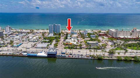 Photo of 311 N N Surf Rd, Hollywood, FL 33019 (MLS # A12070823)