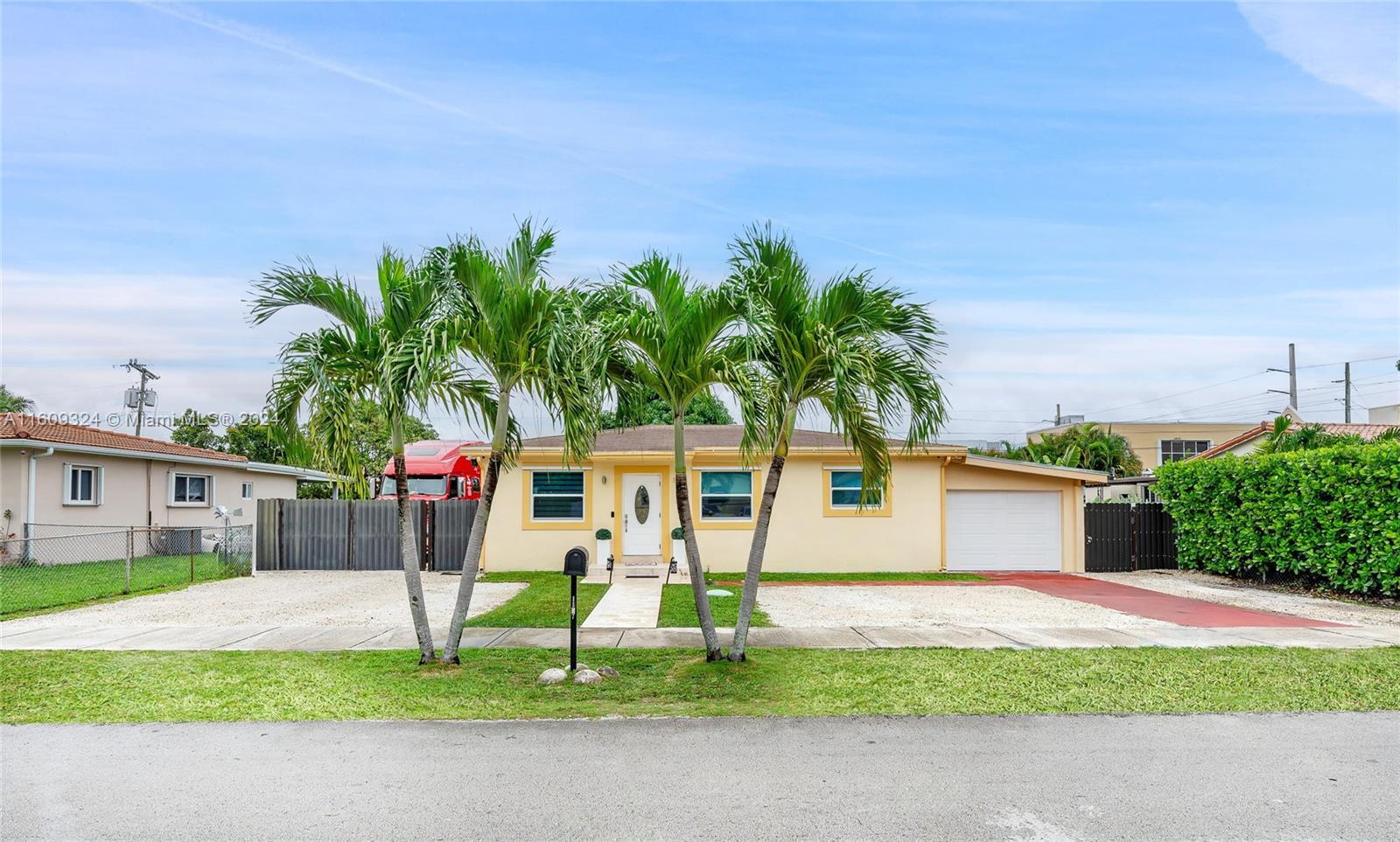Completely Remodeled Home Featuring three bedrooms and one bathroom + one bedroom and one bathroom apartment. Porcelain tiled thru-out, Impact windows and doors, white Modern kitchen cabinets and all stainless steel appliances.