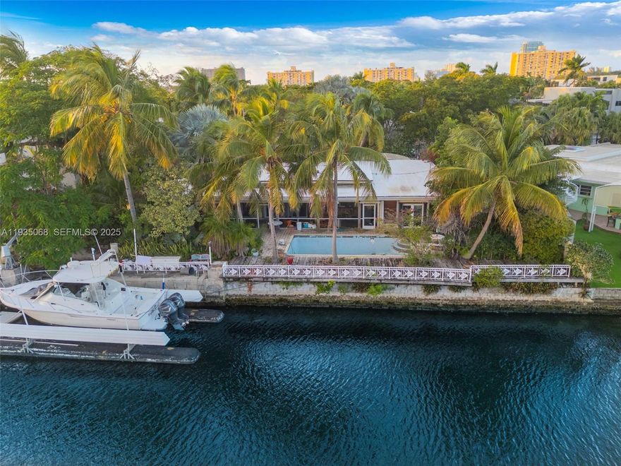 Rare opportunity to design your piece of paradise in prestigious Keystone Point, a gated waterfront enclave in North Miami. This kind of deepwater access and privacy is hard to come by. A developer’s and builder’s dream, this site boasts significantly wider water frontage than neighboring parcels, creating a unique canvas for a custom estate, dockage for multiple vessels, or a thoughtfully master-planned redevelopment.  

Centered around a direct waterfront location with ocean access, the property includes an existing 2-bed, 3-bath residence with a generous footprint, pool, large patio, and yard, yet its expansive water-frontage sets it apart from surrounding homes and unlocks elevated design possibilities within this established residential landscape.  

Highly desirable, private neighborhood near Biscayne Boulevard, this site offers both proximity to Aventura, Bal Harbour, beaches, quality dining, and major roadways, and a sense of secluded waterfront living that’s increasingly scarce on the market.