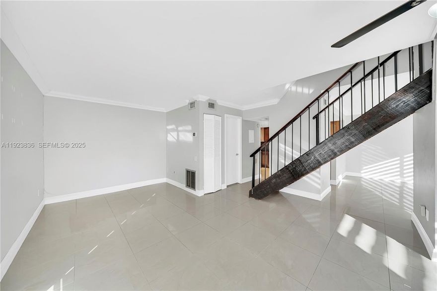 Beautifully updated Snapper Village home offering comfort, style, and convenience. This corner unit features 2 beds/2 baths, porcelain flooring throughout the first level, a spacious kitchen with granite countertops, a breakfast bar, gas range, and wine cooler. Both bathrooms have been thoughtfully updated with modern finishes, and the primary bath includes a dual rain shower and double sinks. Ideally located just steps from the clubhouse and community amenities. Snapper Village offers tennis courts, a playground, an oversized pool, scenic walking paths, 24-hour security with guard gate, upgraded cable/internet package, and ample guest parking.