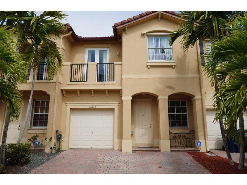 Courts of Tuscany's most desired model! Impeccable with very new kitchen appliances. This attractive model has a large living area, separate dining/family and a bar-height kitchen counter. It is ideal for entertaining children and adults alike, plus a ver y private and enjoyable patio for BBQ and gatherings. The master suite will delight you; magnificent size closet, bathroom with shower & tub. A separate laundry room and the 2 bedrooms with a lovely balconies that adda to that Tuscan setting.