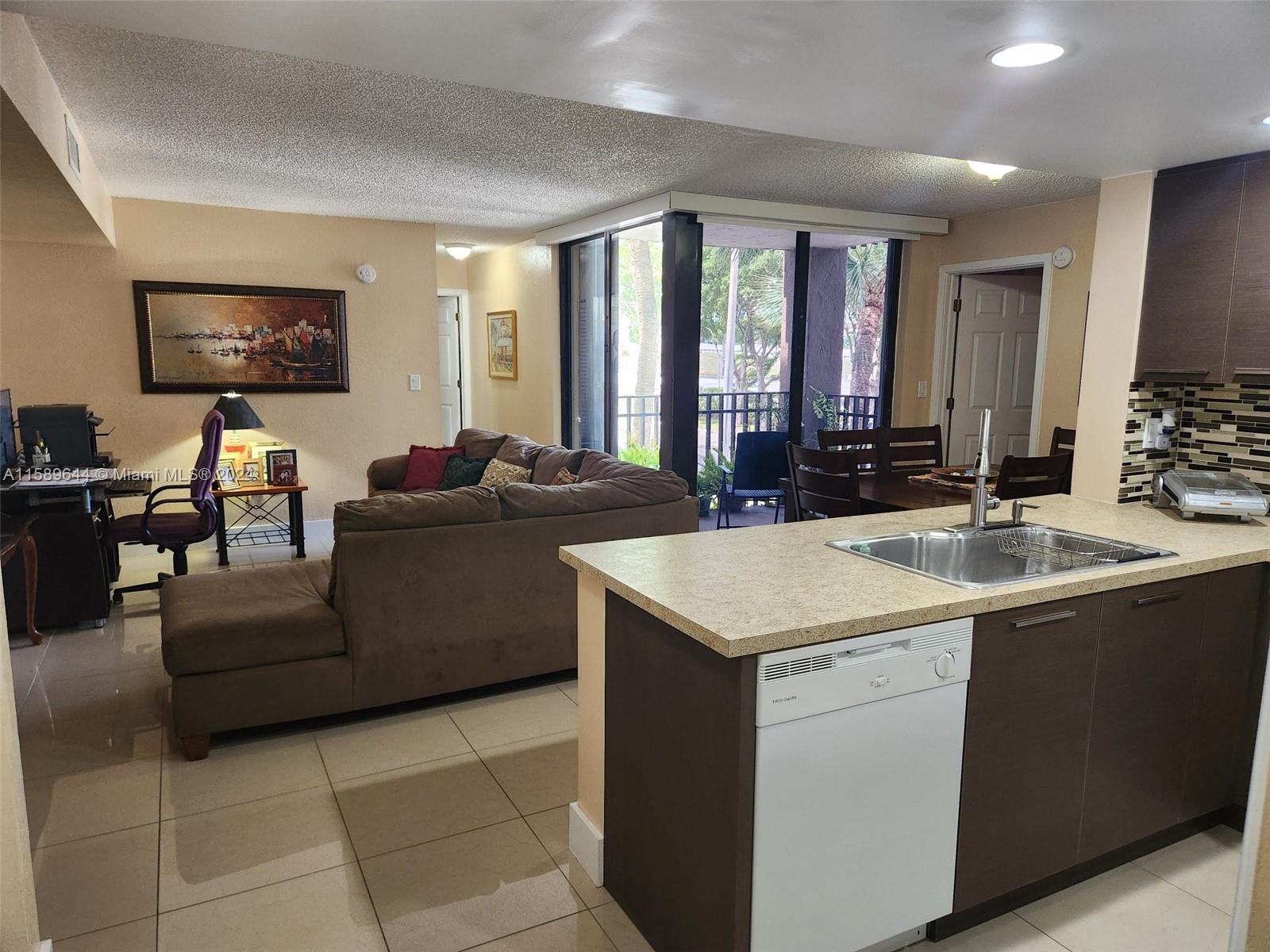 Amazing location with this spacious 2 Bed 2 Bath condo located just off Florida's Turnpike and Bird Road. Property has been tastefully updated and maintained. Features include open concept kitchen, oversized tile throughout, upgraded kitchen cabinetry, updated bathrooms and accordion shutters.