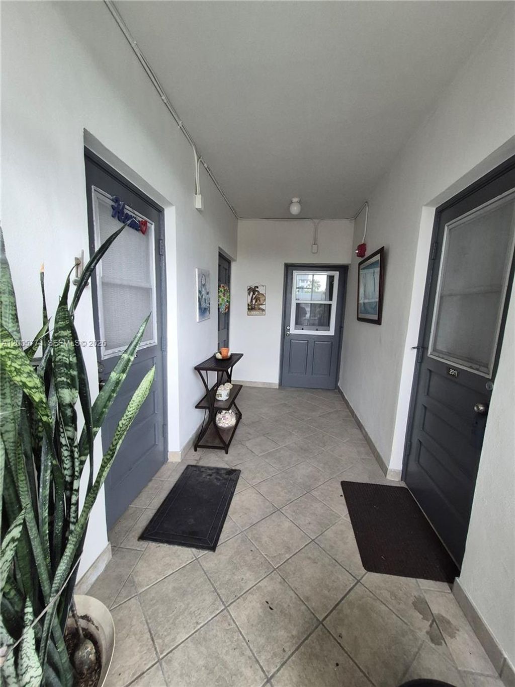 Photo of 415 NE 2nd St #202, Hallandale Beach, FL 33009 (MLS # A12005774)