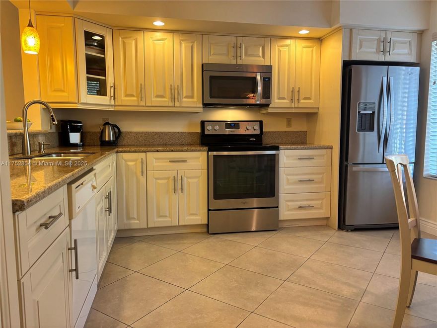 MOVE IN READY, ALL FURNISHED. Almost everything included, BEAUTIFUL turnkey condo in Green Lake, Indian Spring. Completely remodeled, tastefully furnished and decorated. Well equipped kitchen. Large open space dining and living room. Ceramic floors throughout. On the second floor, with views of the lake, palm trees and sunset, you will feel like you live in a resort. Overlooking the pool. Indian Springs is secure, well managed and a tranquil 55+ community. Gulf membership available but not required. CLOSE TO GOLF CLUB and to Atlantic Avenue.