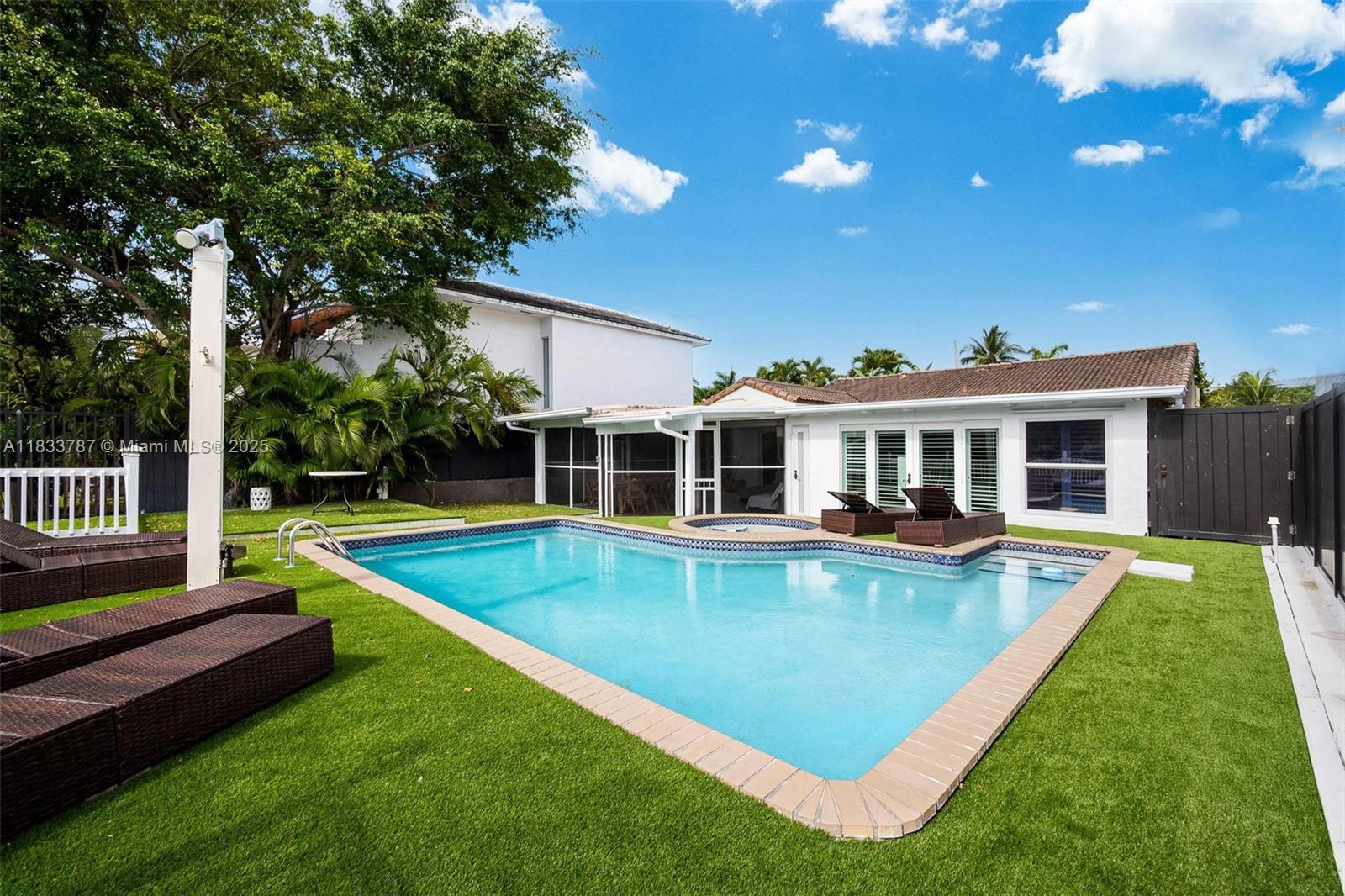 Enjoy this 4 bed fully furnished waterfront home in one of Miami's best-kept secrets; Belle Meade. Only minutes away from Downtown Miami and the Design District. This historic, gated community offers resident's lush, tropical surroundings typically unseen in city living. Kick off your shoes and enjoy majestic sunsets, the warmth of the sun, and the serenity that waterfront living brings. Prepare a meal in the expansive gourmet kitchen and entertain guests for waterfront dining dockside, or in the spacious screened-in porch. Come see what makes this home perfect for every occasion.
