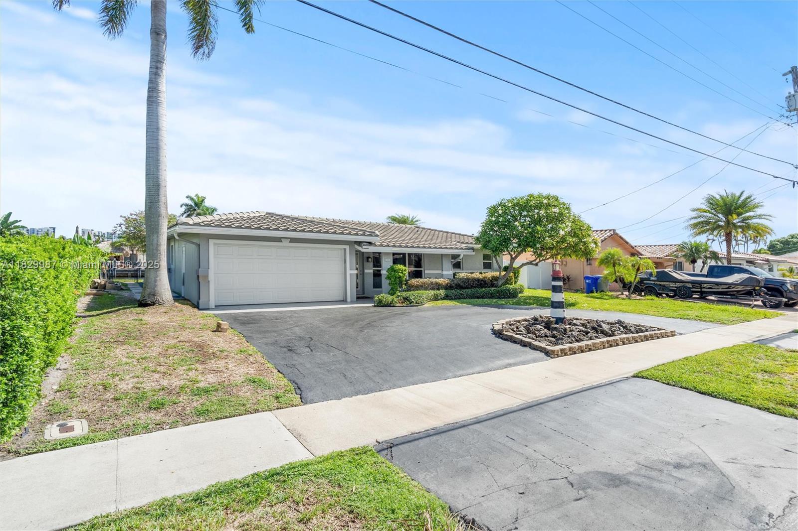 Wide canal waterfront GEM in Garden Isles! Amazing ocean access canal with tons of upgrades. The property has a newer kitchen with appliances, newer bathrooms, a newer roof including flat roof installed in 2020, all impact windows and doors, newer high flow self timed pool pump, seawall has had extensive work, including 4 batter pilings and a new footer and much much more! The property includes architectural plans for a third bedroom. The property sits on a great street with 70 feet of waterfront. Nestled in a quiet family-friendly neighborhood. MUST SEE!! Will not last!