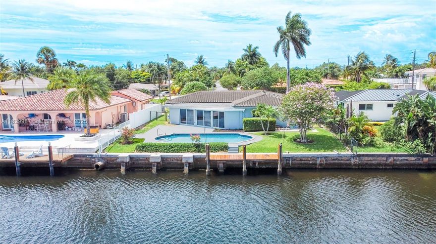 Wide canal waterfront GEM in Garden Isles! Amazing ocean access canal with tons of upgrades. The property has a newer kitchen with appliances, newer bathrooms, a newer roof including flat roof installed in 2020, all impact windows and doors, newer high flow self timed pool pump, seawall has had extensive work, including 4 batter pilings and a new footer and much much more! The property includes architectural plans for a third bedroom. The property sits on a great street with 70 feet of waterfront. Nestled in a quiet family-friendly neighborhood.  MUST SEE!! Will not last!