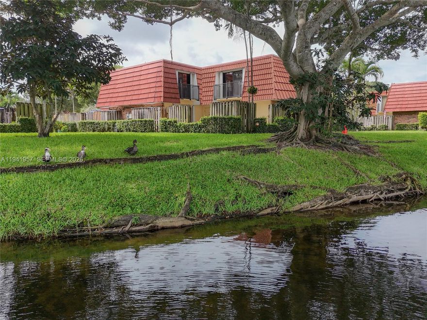 NATURE LOVERS DREAM.  Wake up to a glistening lake and birds signing. Nestled in the beautiful Jacaranda Central Park in Plantation, FL, just minutes from downtown Ft. Lauderdale and the airport plus shopping and entertainment at Las Olas and its beautiful, pristine beach.  Shop and dine at Sawgrass Mills Mall. 2/2.5 newly renovated townhome offers all the comforts of a single family with TWO ASSIGNED parking spaces.  Corner unit on the wide lake with a 280 sf PRIVATE PATIO for you and your furry friends.  Modern kitchen with stainless steel appliances, tile floor on the first floor, second ready for you to make it your own.  Large bedrooms each with private balcony facing the lake.  Wake up to nature at its best.  Ample indoor and outdoor storage. Full size washer and dryer. Community pool. Residents have access to Jacaranda Central Park which offers a variety of amenities including two outdoor heated pools, a whirlpool spa, lighted pickleball and tennis courts, an indoor racquetball court, shuffleboard lanes, and a clubhouse with a multipurpose hall. Residents also enjoy scheduled transportation to local shopping and recreational areas, as well as organized activities like water aerobics and yoga classes. Plantation is a beautiful place to call home.