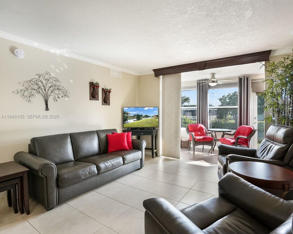 Photo of 2751 N Pine Island Rd #105, Sunrise, FL 33322 (MLS # A11948105)