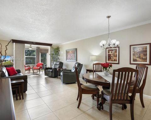 Photo of 2751 N Pine Island Rd #105, Sunrise, FL 33322 (MLS # A11948105)