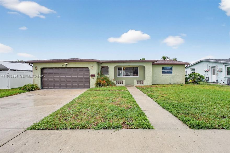 Welcome home to this move in ready gem in a sought after NON-HOA community! This charming 3 bedroom home plus an enclosed Florida Room offers 2 full baths and a 2 car garage, with all the big-ticket upgrades already done. Enjoy peace of mind with a newer roof (2017), impact windows and front door, plus a new A/C and water heater (2023). Stylish vinyl and tile flooring flow throughout, while the enclosed Florida Room adds flexible space, perfect for family time, a home office, or year-round relaxation. Step outside to a fully fenced yard ideal for kids, pets, and weekend get togethers. A true turnkey home ready for its next chapter!
