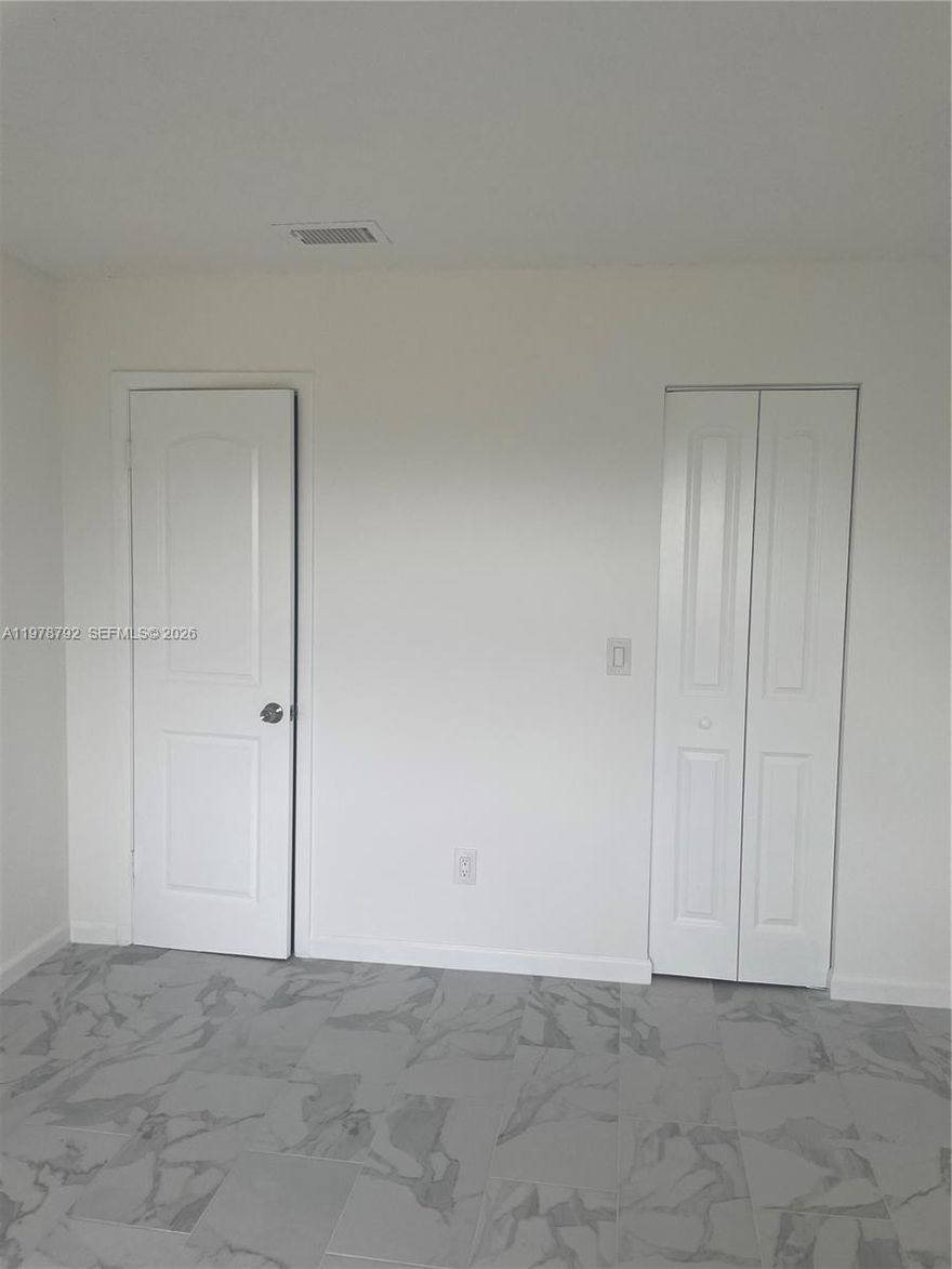 Small two-story building. Spacious 2 Bed / 2 Bath unit located in a gated community. Ideal location just 10 minutes from the City of Aventura, with easy access to I-95, the Turnpike, and US-441. Low HOA fees and low property taxes, making it perfect for investors or first-time buyers. Excellent rental potential Great opportunity—don’t miss it