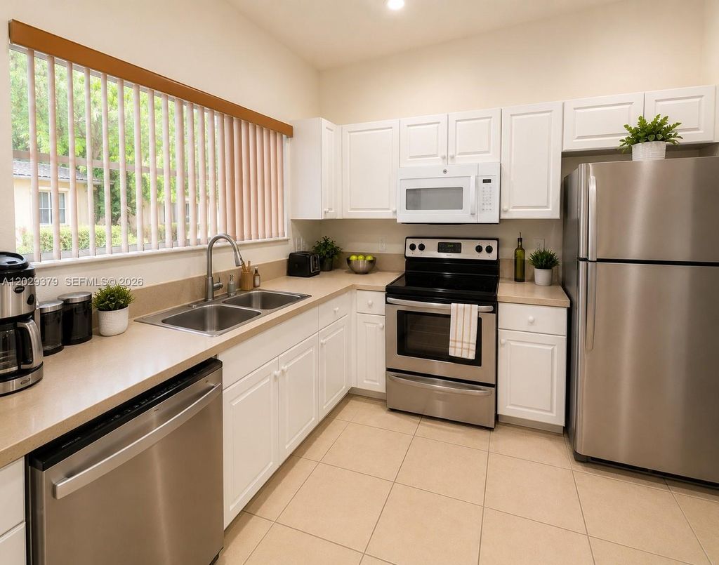 Photo of 3856 SW 48th Ave #3856, Hollywood, FL 33023 (MLS # A12029379)