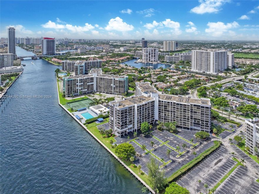 This property is situated along the Intracoastal Waterway, offering scenic water views to enjoy endless Sunrises and Sunsets from your balcony. The unit is renovated with tasteful finishes and decorated. It is a turn-key unit sale. Building offers an array of amenities like fitness center with cardio studio as well as boxing and yoga studio. Pool with sundeck, tennis courts and club house, library and playroom. Located in a prime residential area of Hallandale Beach, close to shopping centers, conveniences, restaurants, Gulftream Park horse race tracks and Casino with many entertainment venues and Golf club by membership at The Diplomat Country Club. Walk, ride or bike to the city white sandy beaches. Live, Work & Play here!