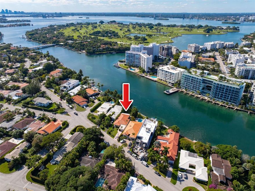 A rare opportunity to secure a waterfront address in one of Miami’s most coveted neighborhoods. This 9,650 square foot lot with 64 feet of water frontage offers the perfect foundation to create a world-class residence.
Just minutes from the ocean, The Surf Club Four Seasons, and Bal Harbour Shops, the location delivers both privacy and pedigree. The existing home offers tranquil water views and endless potential. Ideal for building new, redesigning, or expanding.