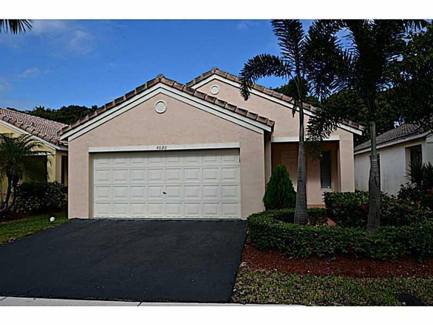 LOCATION !! Remodeled single family home. Tile in all living area, laminated flooring in all three bedrooms. Screened patio. Stainless Steel appliances. Freshly painted. Ready to move in. The Ridges