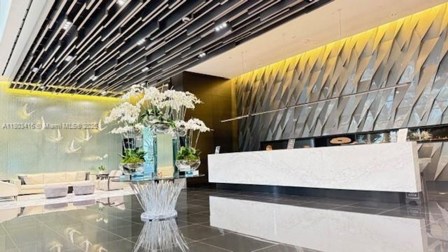 Beautifully 1/2 at the flagship building for Miami Worldcenter. Private elevator and private foyer invite you to this luxurious unit, in the building with the most amenities in the world.  The unit has been totally redone (spent $100K) as the all new bathrooms and showers, all new porcelain floors throughout, all new walls and custom made closets. Big corner balcony with new floors too. It ready to move in, and no one was lived in after renovation. Unit is vacant and empty and easy to show.