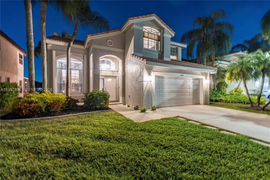 Beautifully updated 3-bedroom, 2.5-bath residence featuring a spacious loft and a 2-car garage, perfectly positioned on a large, beautifully landscaped lot with serene water views perfect for entertaining. This turnkey home has been thoughtfully and tastefully updated, offering a remodeled kitchen with modern finishes, all the bathrooms have been updated with top of the line finishes, and luxury vinyl flooring throughout the upstairs living areas. The open and functional floor plan provides generous living and entertaining spaces filled with natural light. Step outside to a gorgeous backyard overlooking the water which is an ideal setting for relaxing, outdoor dining, or entertaining guests. Meticulously maintained and move-in ready, this home combines comfort and style. Conveniently located in the highly desirable Silver Lakes at Coconut Sound community, close to parks, schools, shopping, dining, and major roadways.