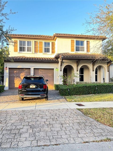 Photo of 15041 SW 177th Ter, Miami, FL 33187 (MLS # A11956339)