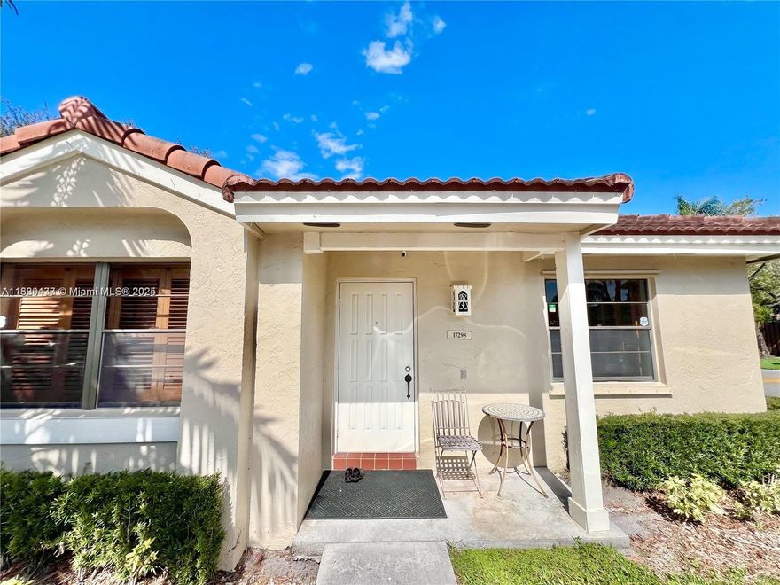 Lovely 2/2 corner, 1-story villa at The Moors. Covered front porch, foyer entry, spacious living and dining areas with glass doors to screened-in covered terrace. Remodeled kitchen with granite countertops and stainless steel appliances. Updated bathrooms, stackable washer/dryer, plantation shutters, alarm system, panel hurricane shutters, storage room and 2 assigned parking spaces in front of the unit. Barrel tile roof from 2016 and new A/C 2024. This is a private, gated community with 24-hr security. Amenities include: pools, clubhouse, exercise room, lakes, parks, tennis courts, basketball and much more. Fiber optics services, cable and internet are included in the Association as well as roof repairs.