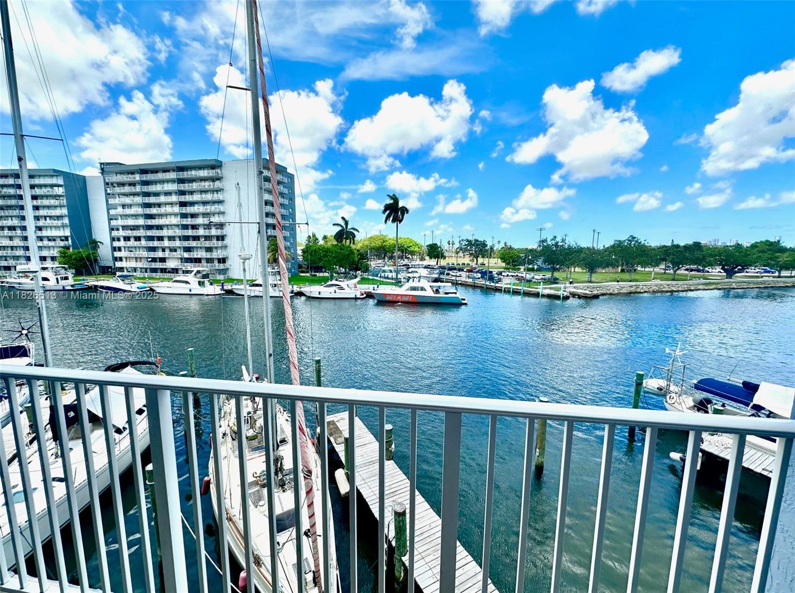 Waterfront 2-bedroom, 2-bathroom. Includes two assigned parking spaces on the same floor as the unit. New A/C. Tiled throughout. Primary suite features an updated private bathroom and a walk-in closet. Updated kitchen features stainless steel appliances and quartz countertops, complemented by in-unit washer and dryer. Enjoy the unobstructed water views from the covered balcony. Impact windows and doors. Residents benefit from 24-hour security in this gated community, situated along the historic Miami River. Conveniently located near Downtown, Brickell, Wynwood, and the Design District, with quick and easy access to the 836 Freeway.