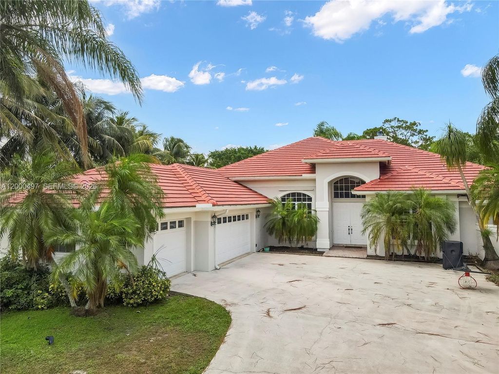 Photo of 11859 Sanbourn Ct, West Palm Beach, FL 33412 (MLS # A12000497)