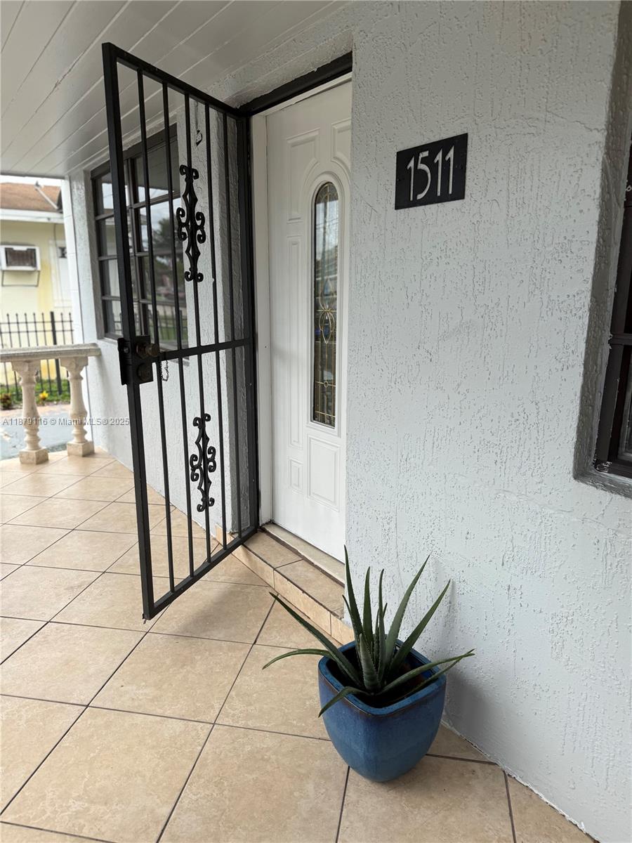 Lovely 2 Bed/1 Bath unit in a fenced in Multi-Family Property! This spacious 900 sq ft home features tile flooring throughout, fresh paint, and brand-new recessed lighting that brightens every room. The A/C was just serviced, ensuring cool comfort year-round. Enjoy a private porch and a lovely patio — perfect for relaxing or entertaining.
Located in a quiet, residential neighborhood just minutes from I-95, this home offers easy access to Downtown Miami, Wynwood, Midtown, and the Design District. Close to schools, parks, public transit, and shopping, this is a fantastic opportunity to live in a well-maintained and conveniently located property. Vacant and Easy to Show. Call today!