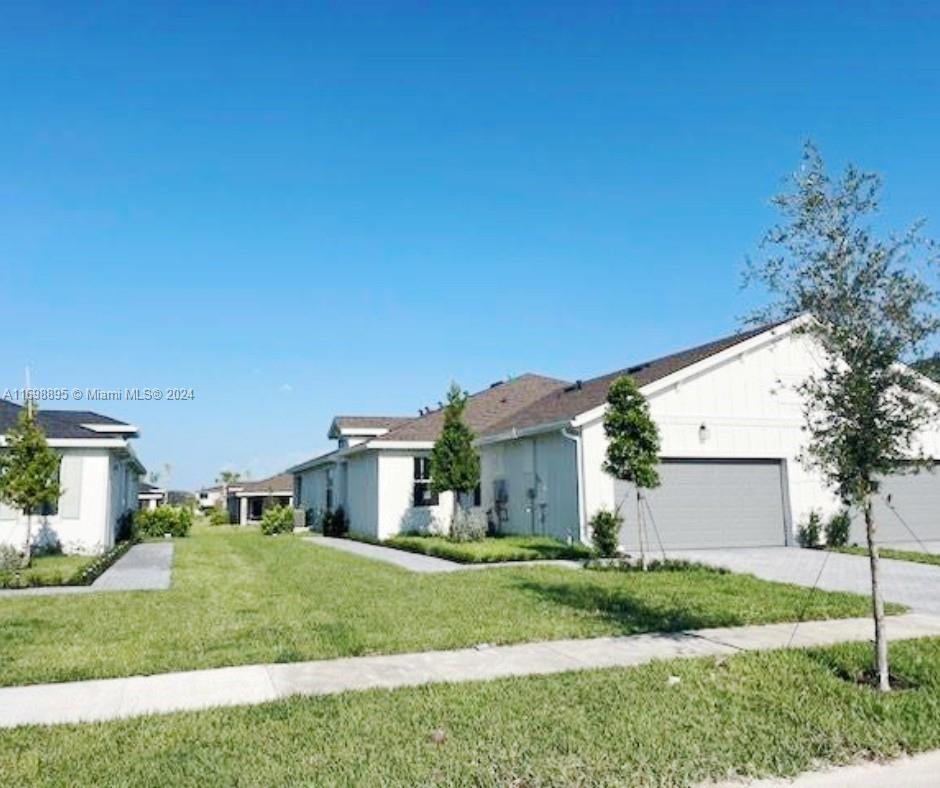 Photo of 1375 Tangled Orchard Trce, Loxahatchee, FL 33470 (MLS # A11698895)
