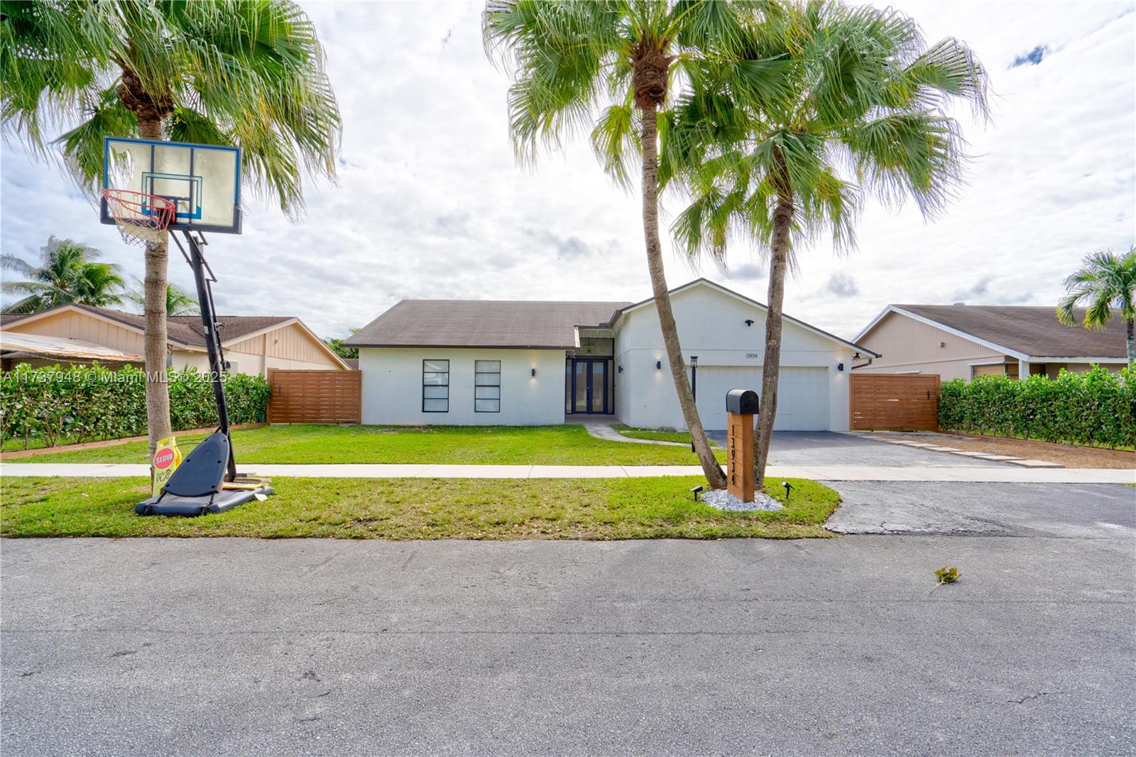 Beautifully maintained 4BED, 2BATH single family home located in an amazing neighborhood in West Kendall. This property is centrally located with a short distance to the 874, Turnpike and a numerous of stores, supermarkets and restaurants. Also, close to multiple A+ schools. This home offers tile floors all throughout, updated Kitchen and bathroom. Open layout with an amazing view to the backyard and pool for entertaining. Great size master bedroom with access to the outside terrace. Side entrance for 30 ft boat or other equipment. Pool is child proof with a fence all throughout, has a water heater and salt system. Come see this beautiful property for yourself, you will fall in love with the light and tranquility of this place. Pool and lawn maintenance included.