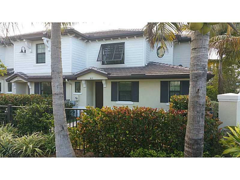Beautiful living, just ONE BLOCK FROM THE BEACH. Marble in the kitchen, bathrooms,living/ dining and M aster Bedroom which is conveniently located in the first floor. The Unit has One Car Garage and One Assigned Spot plus 2 or 3 more spaces for guest when they will come to enjoy the beach with you. Upstairs also has a Den where you can place the office. Walking closets in all bedrooms.The biggest and THE CHEAPESTat Barefoot Village