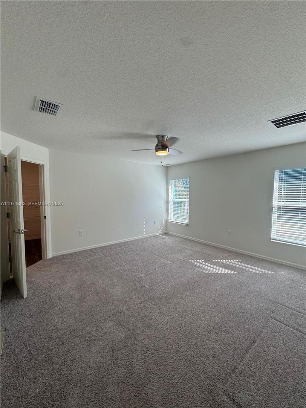 Photo of 314 SW Ray Ave, Port St Lucie, FL 34983 (MLS # A11971493)