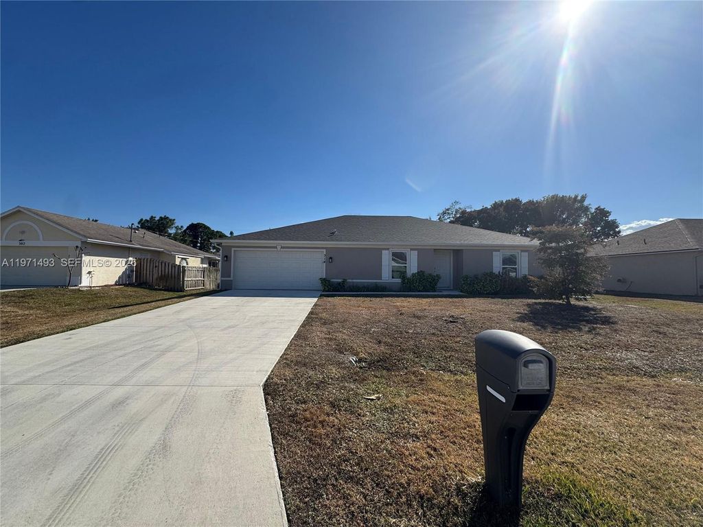 Photo of 314 SW Ray Ave, Port St Lucie, FL 34983 (MLS # A11971493)