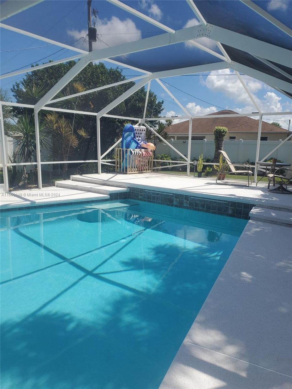 Photo of 224 SW Uneeda Pl, Port Saint Lucie, FL 34953 (MLS # A11660149)