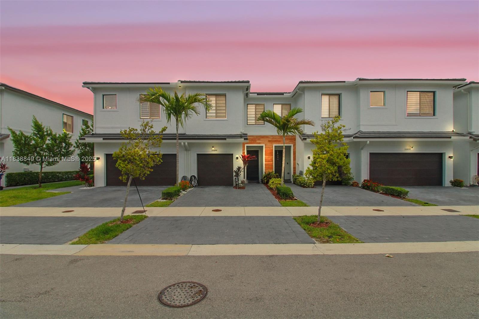 Beautifully maintained 3-bed, 2.5-bath townhome built in 2022! Practically brand new, this spacious and modern home features an open-concept layout filled with natural light, perfect for comfortable living and entertaining. The kitchen features granite countertops, stainless steel appliances, and ample cabinetry. Downstairs, you’ll find tile flooring throughout, a half bath, and sliding glass doors that open on both sides to a fully-fenced backyard. Upstairs, enjoy luxury vinyl flooring! The primary suite offers tray ceilings, a large walk-in closet, and an en-suite bath with double granite vanity and a walk-in shower. Additional highlights include washer and dryer, security system, and energy-efficient construction.