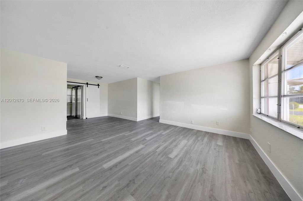 Photo of 2520 NW 2nd Dr, Pompano Beach, FL 33064 (MLS # A12012670)