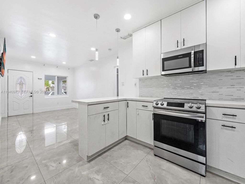 Photo of 1230 NW 35th St, Miami, FL 33142 (MLS # A11940973)