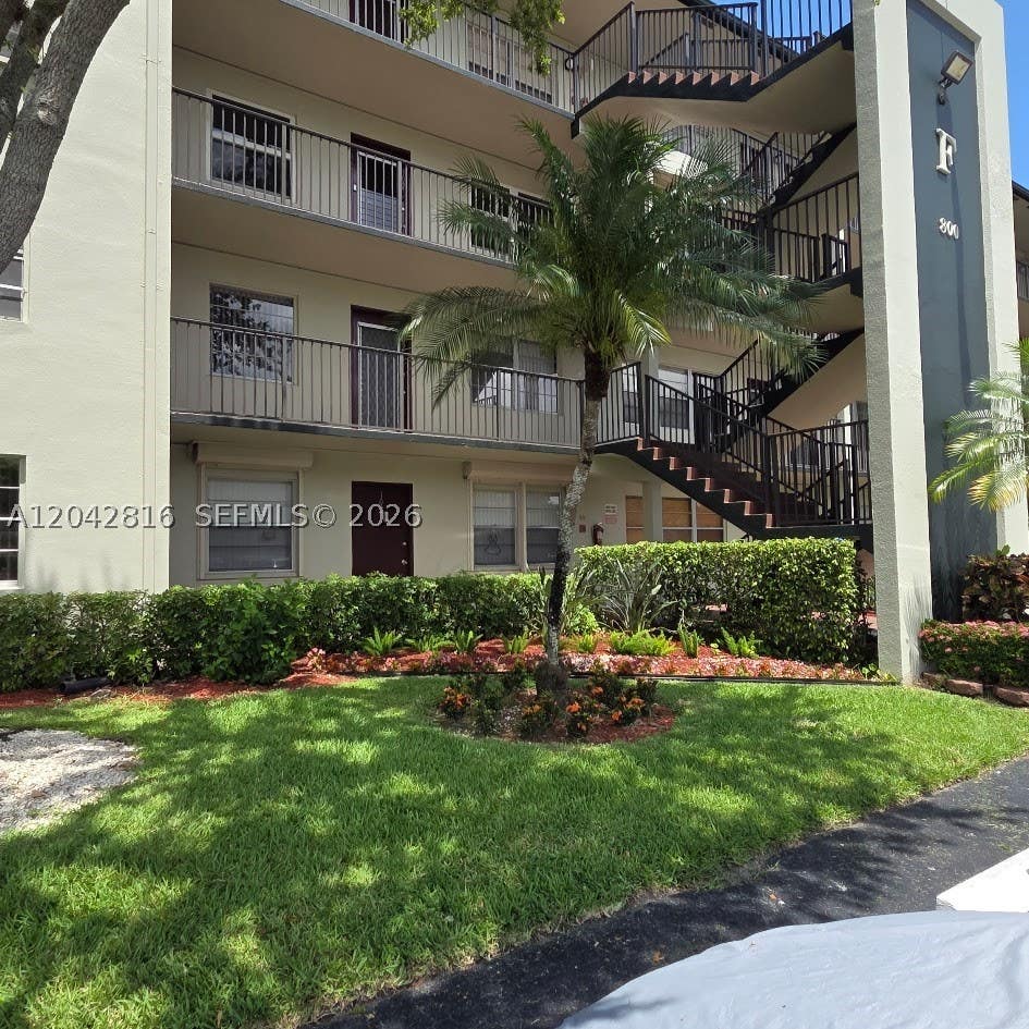 Photo of 800 SW 131st Ave #301F, Pembroke Pines, FL 33027 (MLS # A12042816)