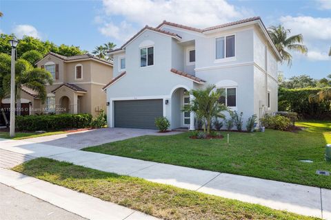 Single Family Residence in Coral Springs FL 903 126th Ave Ave 1.jpg