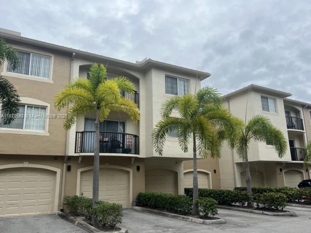 Rare 3 bedroom 2 bath unit located in the Excellently maintained Grand View at Crestwood complex. Third floor unit with vaulted ceilings currently available for immediate move-in. Tiled floors in the rooms, no carpet! Masters has a walk-in closet. The gated community offers resort-type amenities such as two pools, fitness center and tennis courts and two playgrounds on vast open spaces surrounding community, many recent community renovations & improvements completed by association. Centrally located between Southern and Okeechobee Blvd. near Turnpike, Wellington, dining, and shoppes and Palms West Hospital and a Pediatric Only ER. Nest Thermostat and August smart lock to add smart home features. Available now!