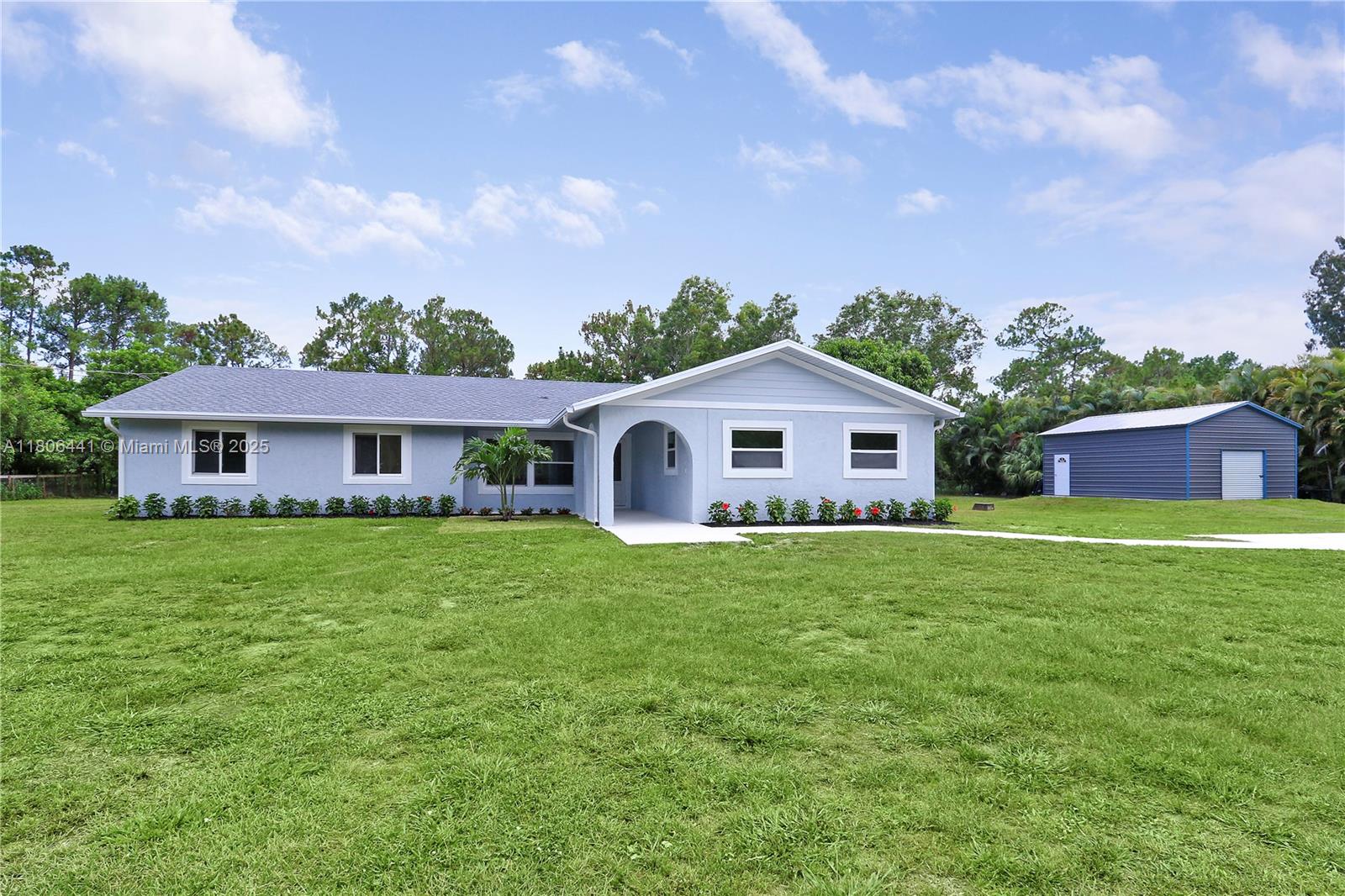 Completely Remodeled 4 Bedroom 2 Bathroom Pool Home with a Detached 500 Sq Ft 2 Car Garage on 1.45 Acres in Jupiter Farms!! NEW Roof. Impact Windows and Doors Throughout. NEW Kitchen featuring White Shaker Cabinets and Quartz Counter-tops PLUS a Butler's Pantry. NEW Stainless Steel Appliances. Bathrooms have been Totally Renovated and feature NEW Vanities, Toilets, Mirrors and Shower Tile. NEW Flooring and Baseboard Throughout. NEW Interior Doors Throughout. NEW Fans and Fixtures Throughout. Updated Electric. NEW Washer and Dryer. NEW Tankless Hot Water Heater. Freshly Painted Interior, Exterior and Patio. No HOA or Restrictions. Located in a Great School District. Easy to Show. Must See!!