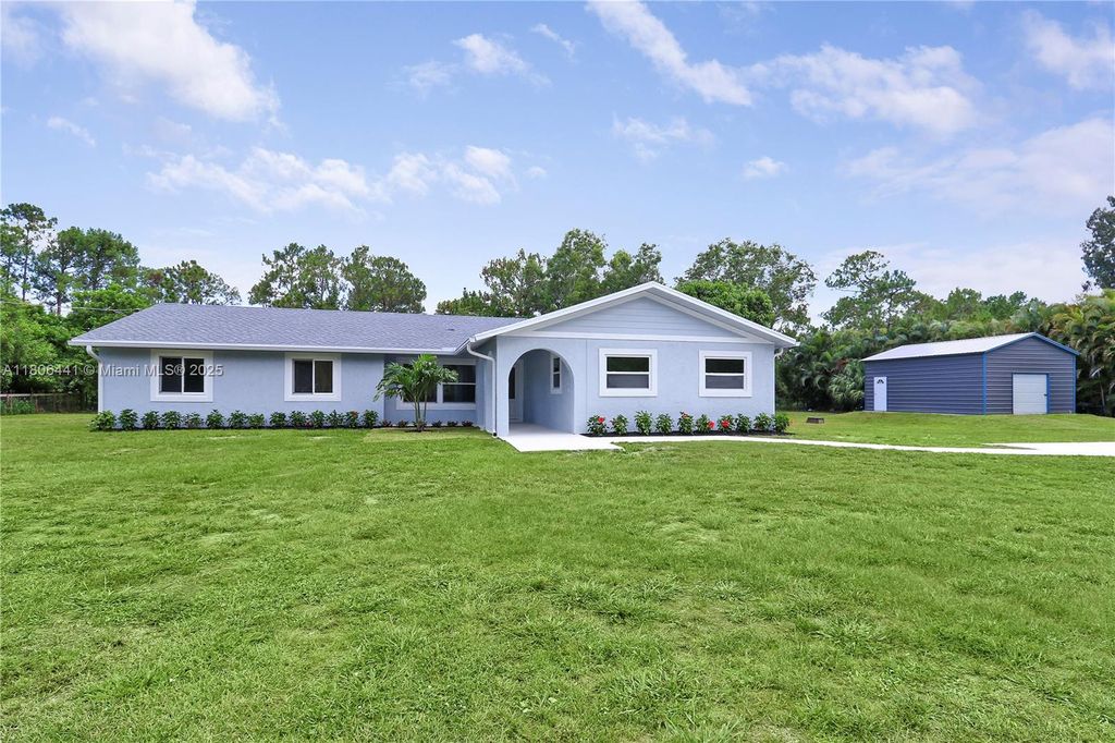 Photo of 12830 165th Road N, Jupiter, FL 33478 (MLS # A11806441)