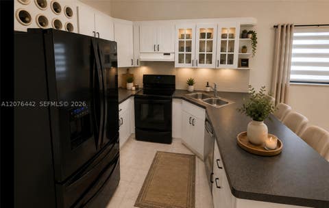 Tiny photo for 2121 W 54th St, Hialeah, FL 33016 (MLS # A12076442)