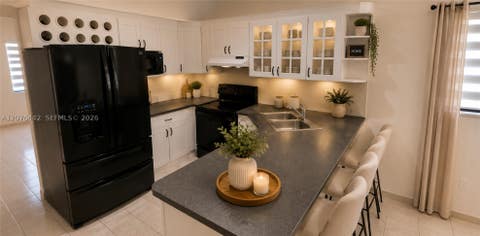 Tiny photo for 2121 W 54th St, Hialeah, FL 33016 (MLS # A12076442)