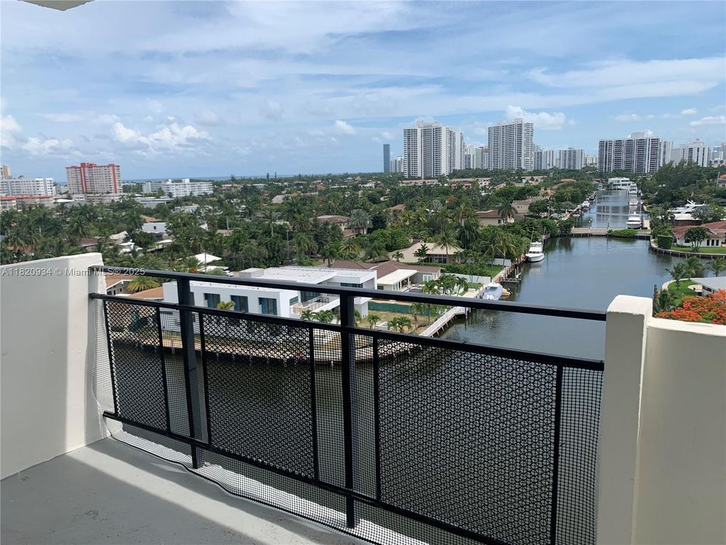 Photo of 401 Golden Isles Dr #1006, Hallandale Beach, FL 33009 (MLS # A11820934)