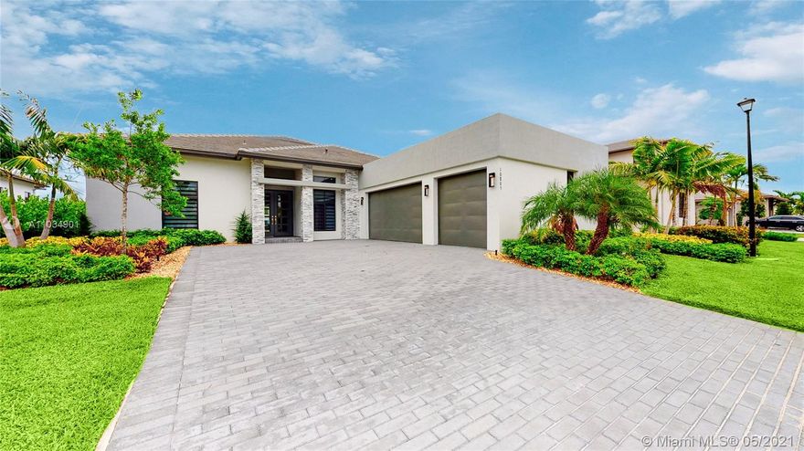 Florida´s Dream Home in Cascata at Miralago –resort style gated community-. Unique, desirable 1-Story,
canal view, clean and spacious Floor Plan, 4Bed3Baths. Additionally to its elegance, versatile design, and warm ambients, this home comes with many upgrades: high impact glass main doors, redesigned master room, upgraded bathroom, smoothly finished walls, upgraded modern Lighting throughout, flooring, all custom closets, windows treatment, Gourmet kitchen with large island/sink, gas cook-top, quartz counters, upgraded cabinets, top of the line appliances, trash compactor, redesigned laundry room with counter and functional cabinets, three car garage with sink, exterior electrical outlets & gas connection, security cameras system, prewire Smart-Home.  Access to two gorgeous Clubhouses.